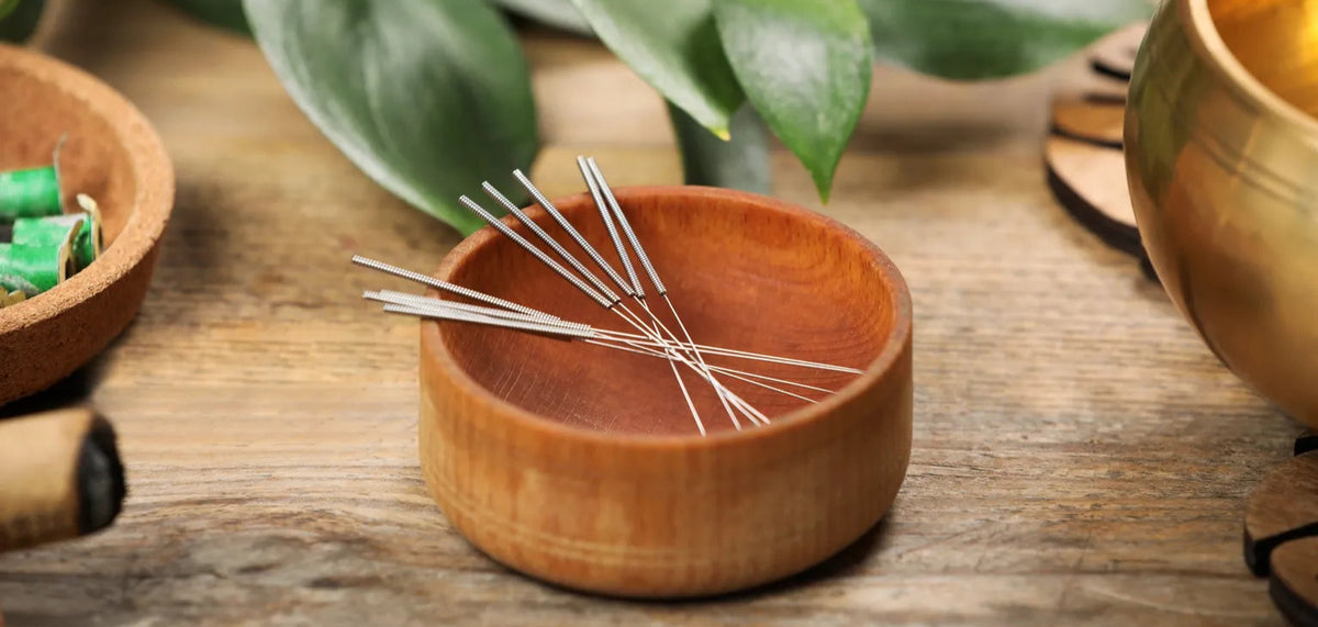 Acupuncture needles in a bowl